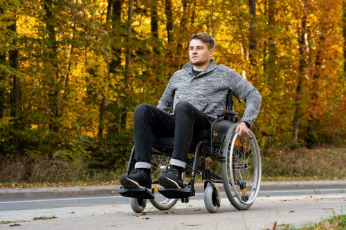 EVERYDAY-TIM Aluminium Wheelchair with Optional Elevating Footrests and Attendant Brakes